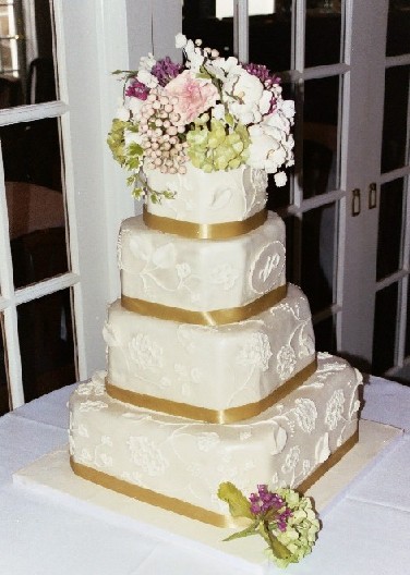 monogram wedding cake This four tier monogrammed rolled fondant wedding 